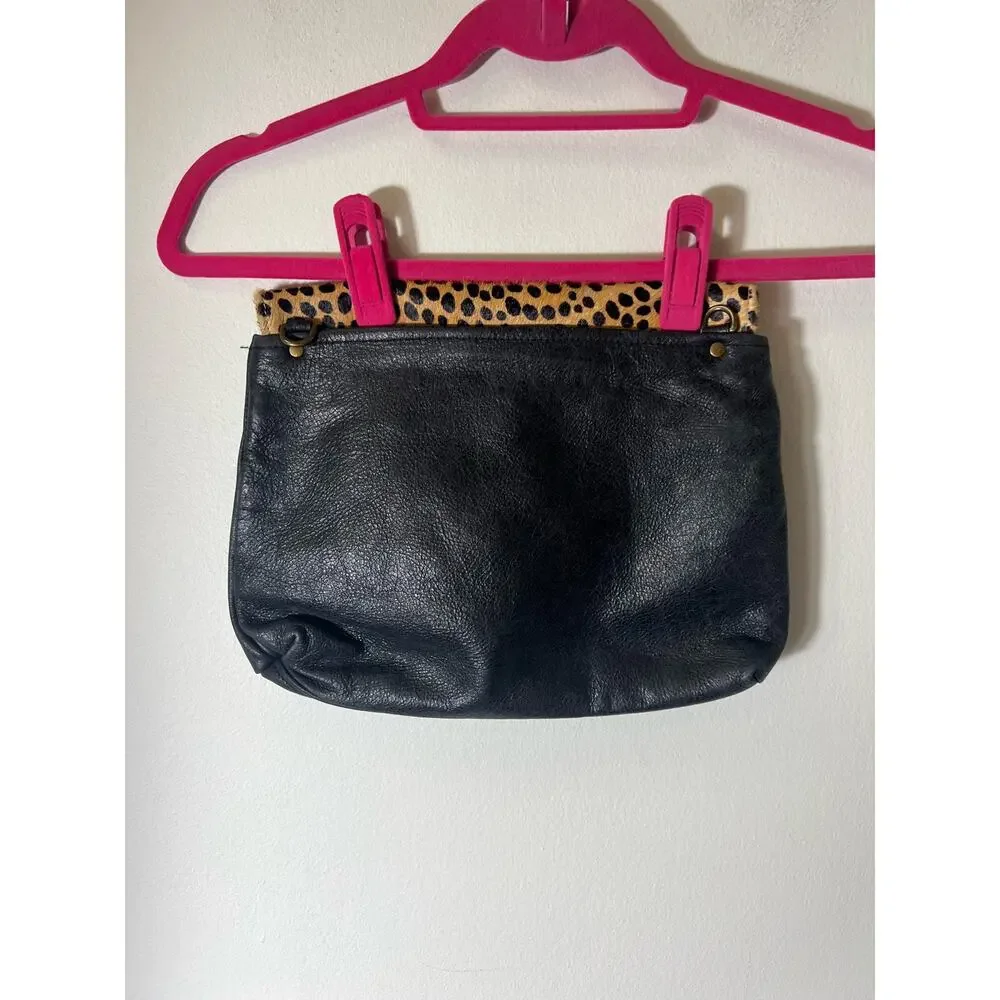 Black leather Clutch with leopard print closure and canvas lining